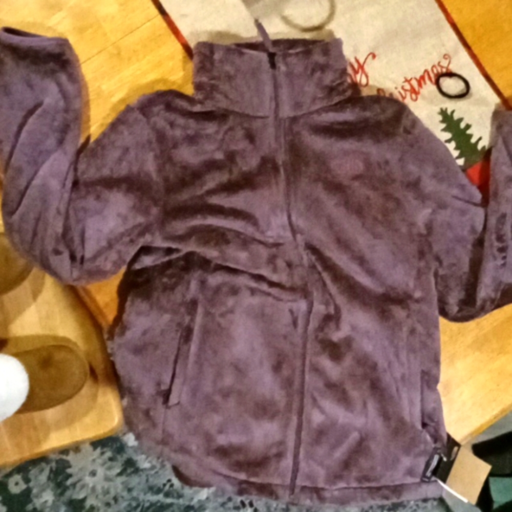 North face woman's large fleece zip up plum